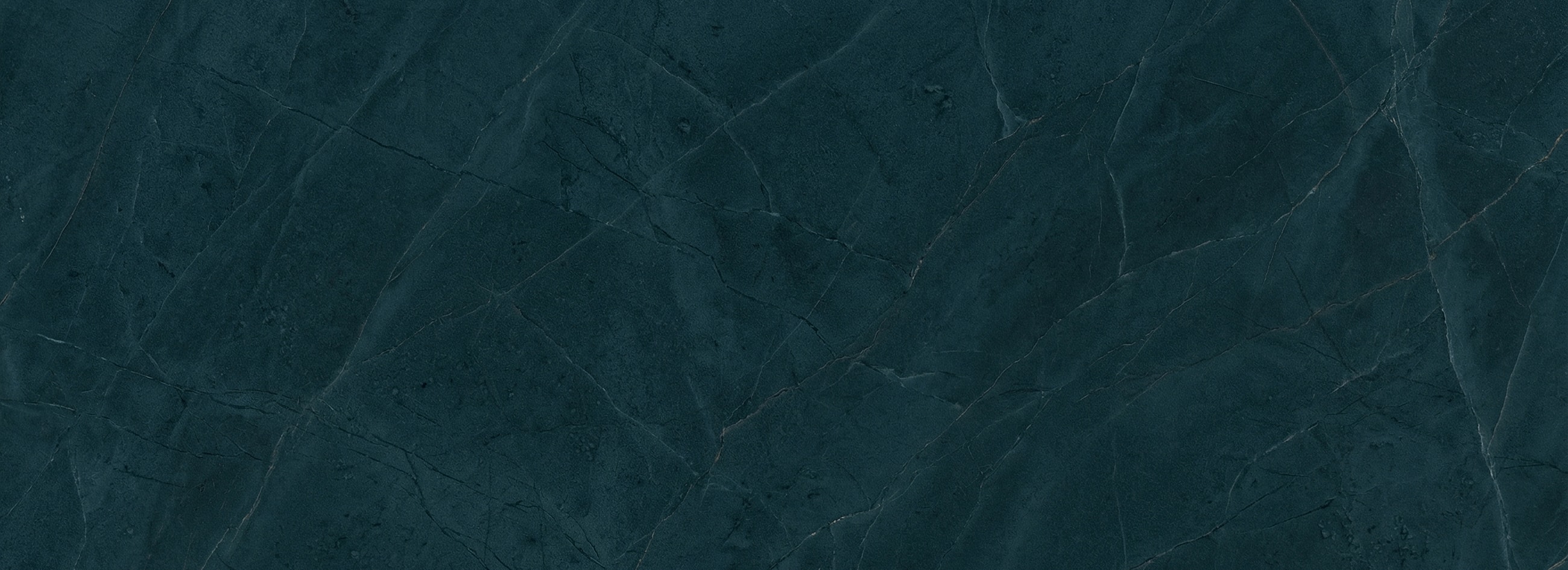 Dark textured stone background with subtle fissures.
