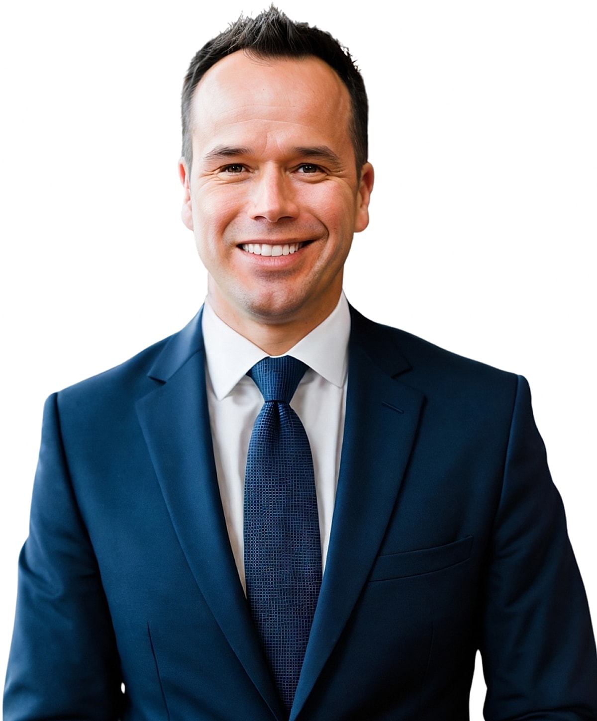 Smiling man in a dark suit and tie.