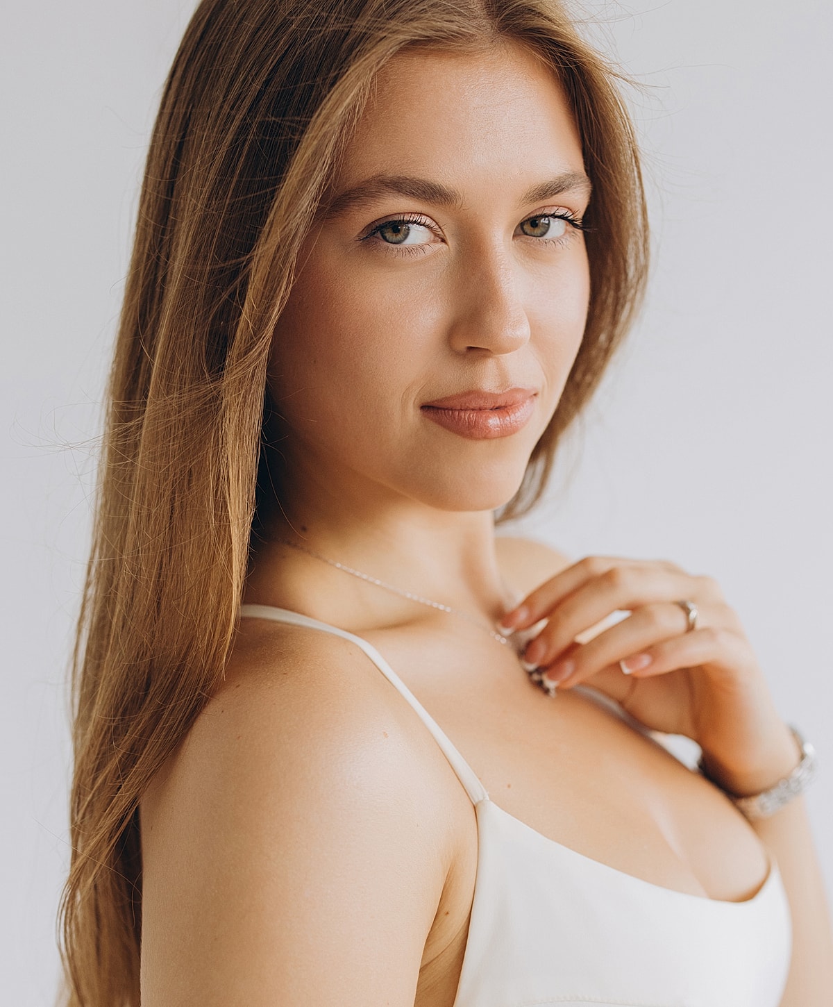 Portrait of a woman with long, flowing hair.