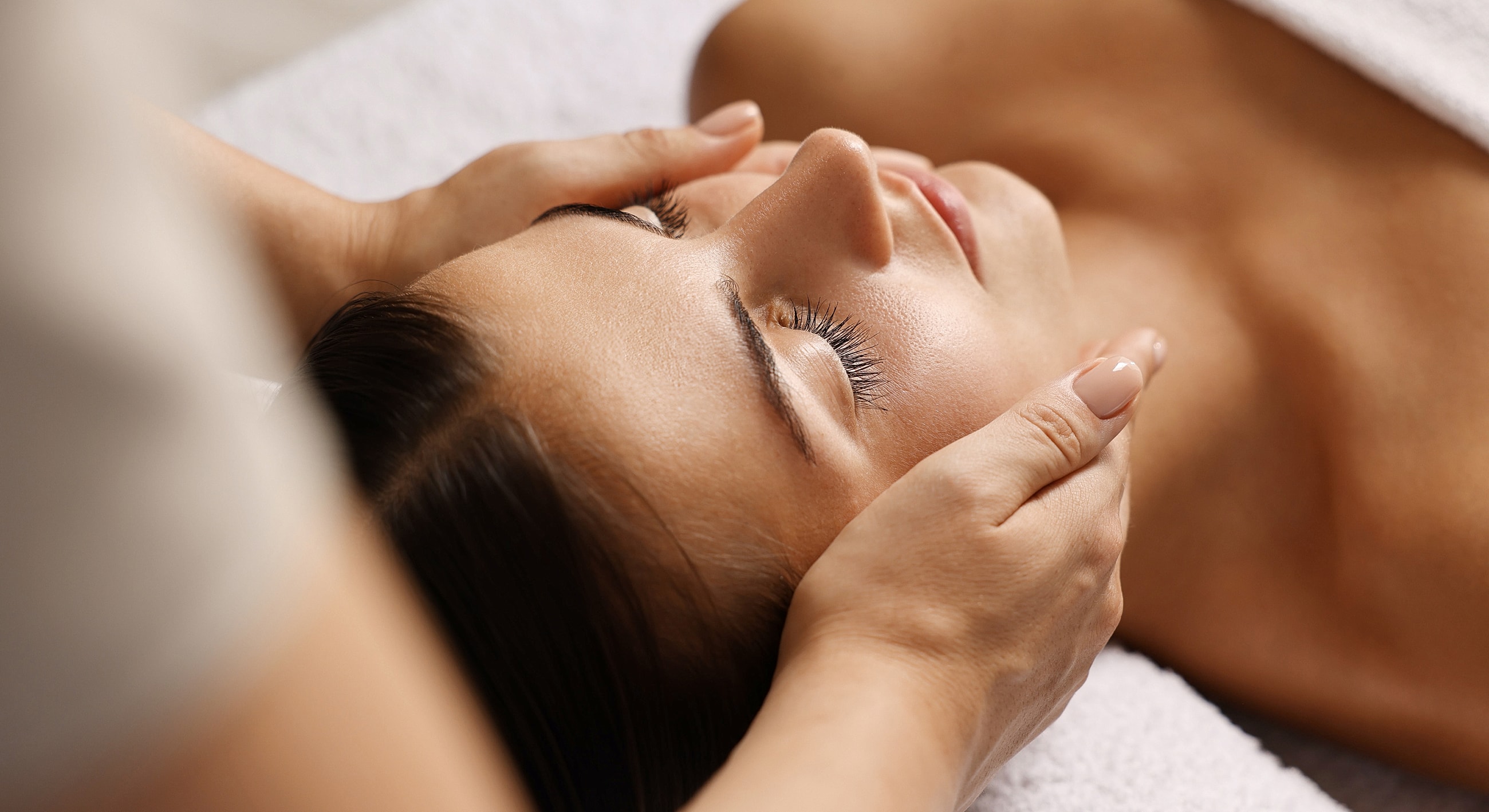 Facial treatment with gentle massage technique.