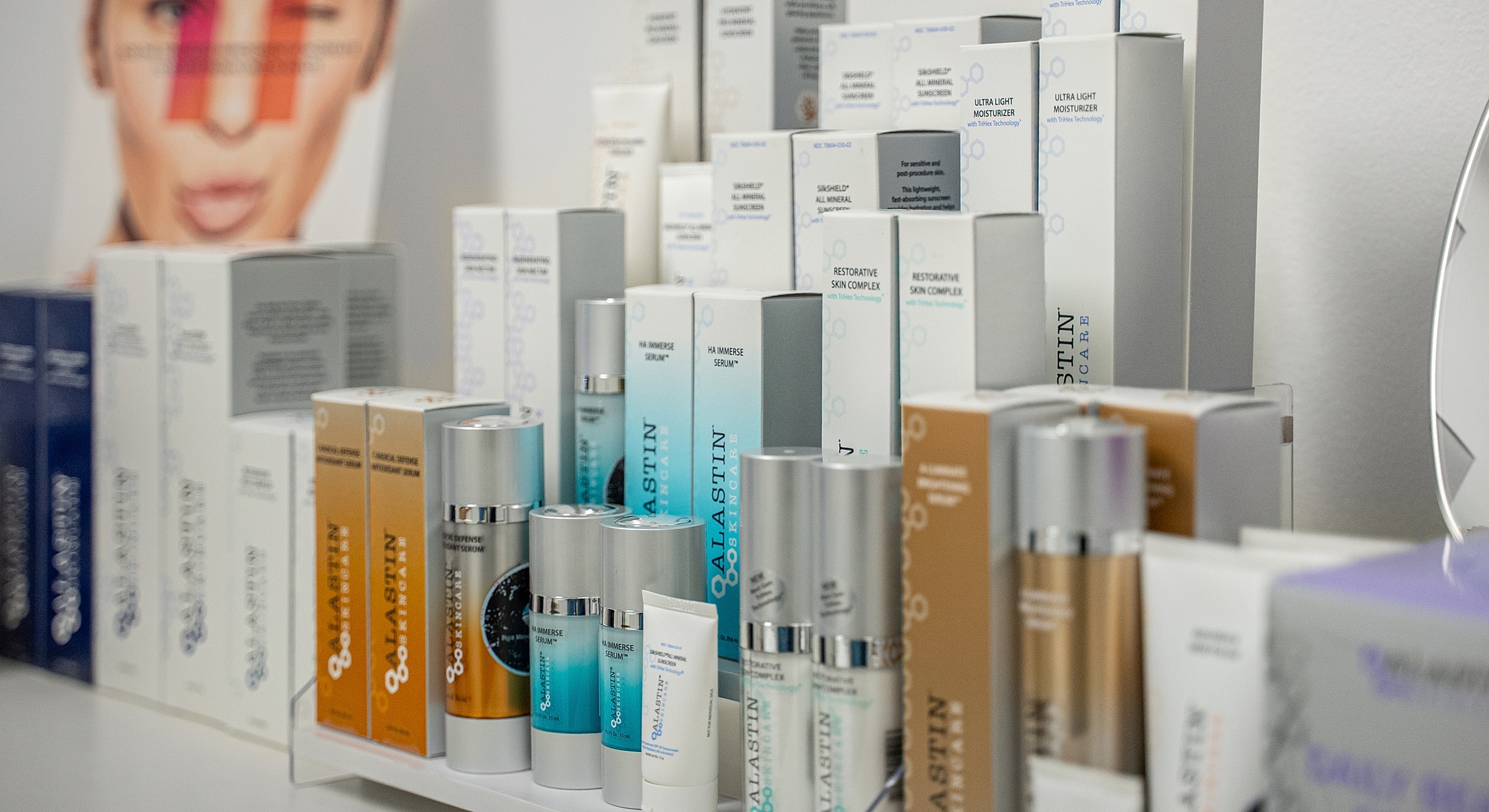 Skincare products displayed on a shelf.